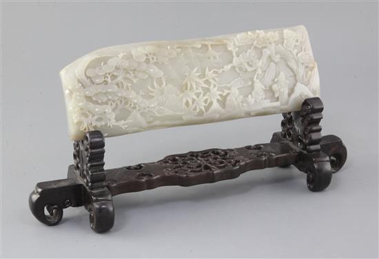 A Chinese pale grey jade plaque, 28.5 x 10cm excluding wood stand